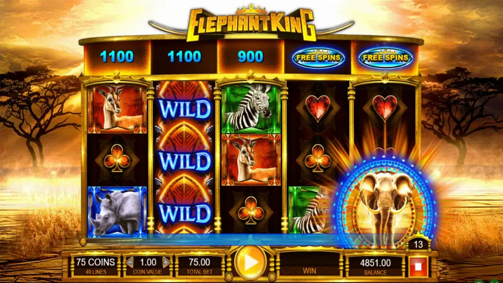 Elephant King slot reels showing wilds, zebras, and free spins symbols activating a feature round.
