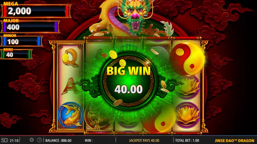 A big win screen in Jinse Dao Dragon with coins bursting around a glowing green circle showing the win amount.