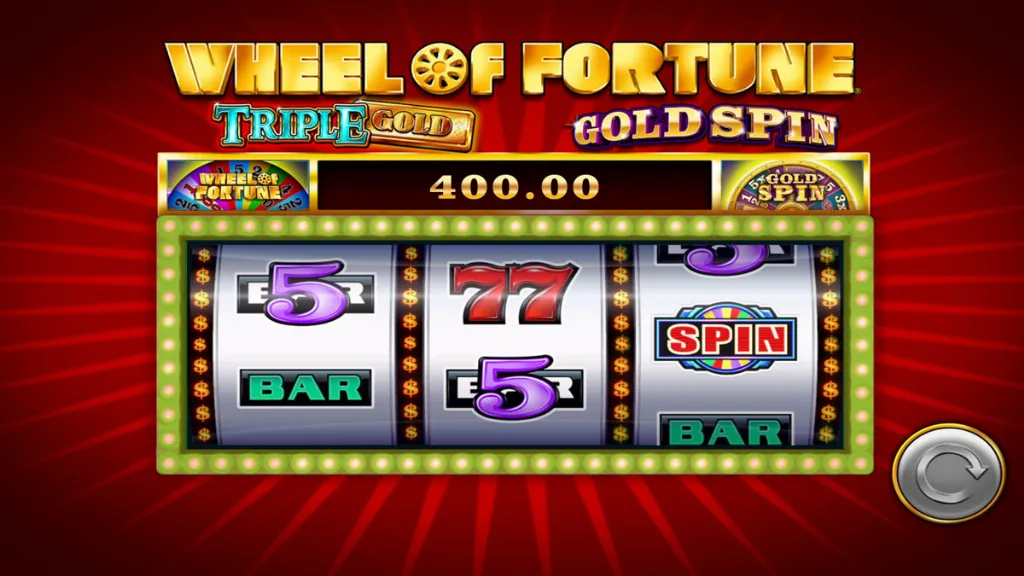 Wheel of Fortune Triple Gold Gold Spin slot showing bonus symbols landing to trigger the Gold Spin feature.