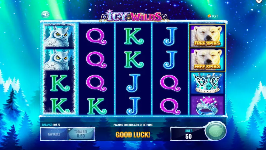 Icy Wilds slot reels showing owls, crowns, gemstones, and card letters during standard play.