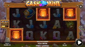 Cash Mine triggering the free spins bonus with Mine Tunnel scatter symbols.